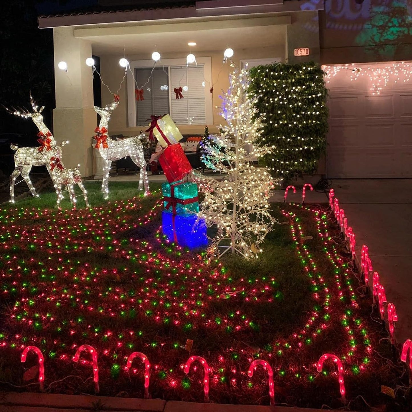 YEGUO Solar Fairy Lights Outdoor Waterproof, 4 Pack Each 33ft 100 LED String Lights, 8 Modes Silver Wire(Green and Red)